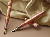benu-haute-lustre-fountain-pen-resin-amber-11-2-3-6-0-detail-angled.jpg